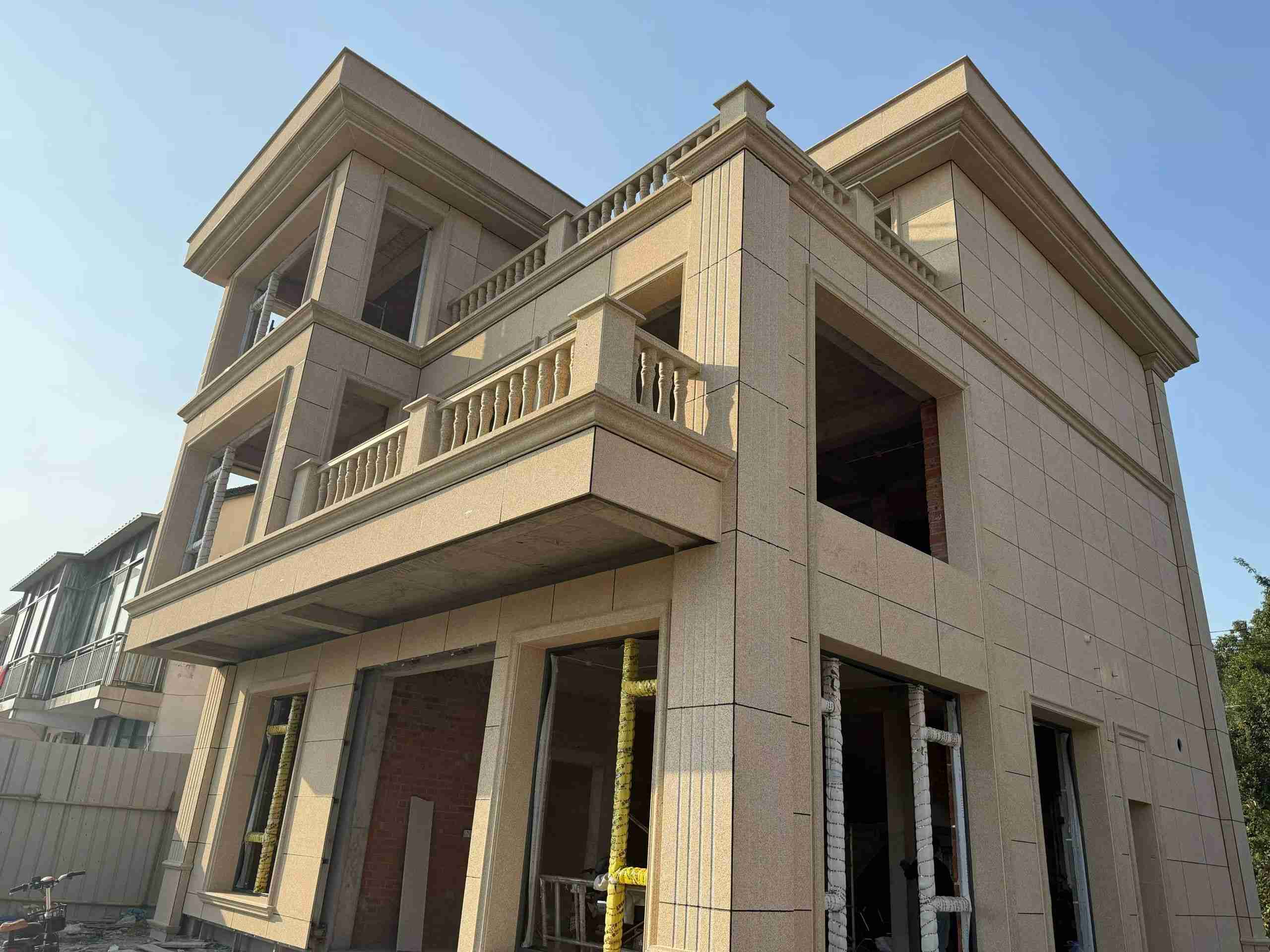 随州 黄金麻花岗岩石材荔枝面外墙干挂效果展示